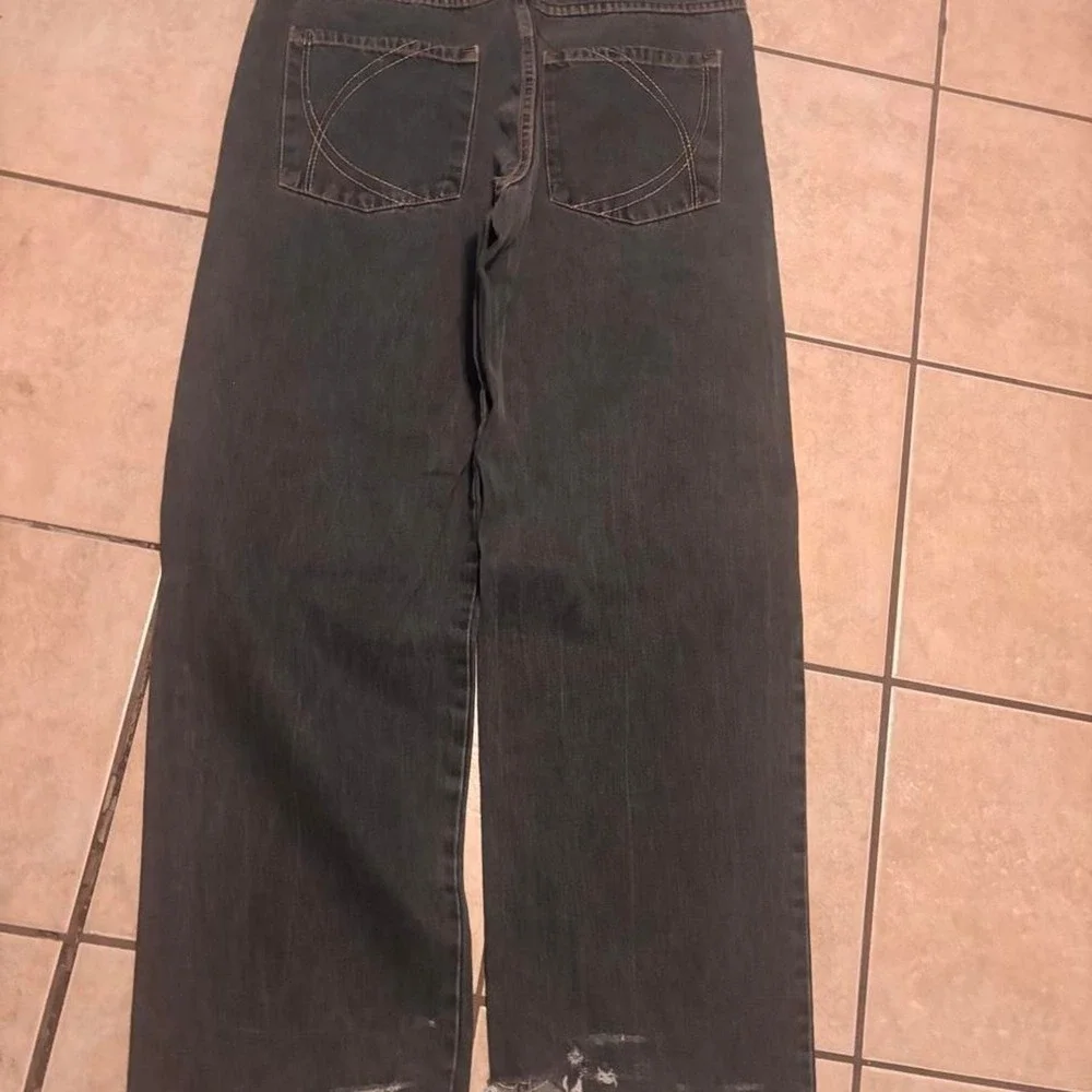 Baggy skater jeans with a distressed look Size 36x34